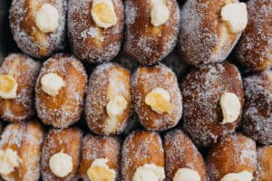 Cereal milk donuts with cornflakes on top