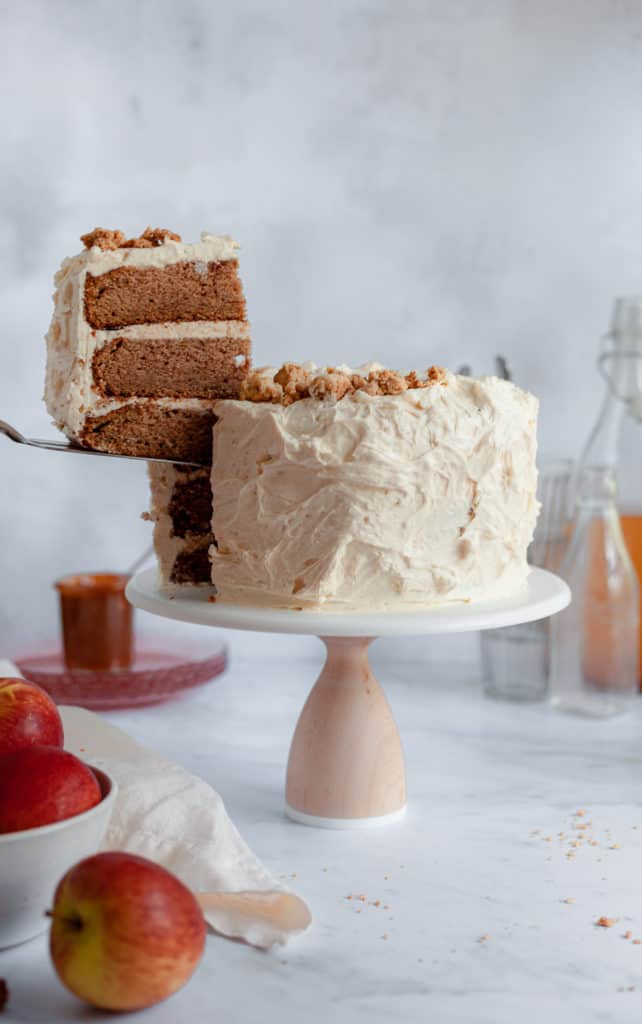 apple layer cake with one slice being taken out