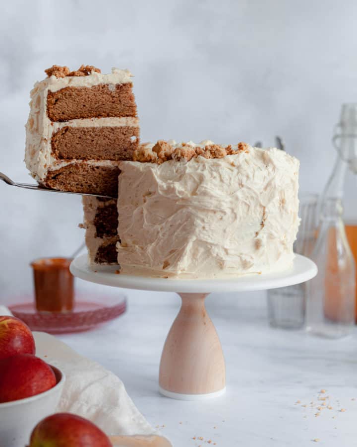 apple layer cake with one slice being taken out