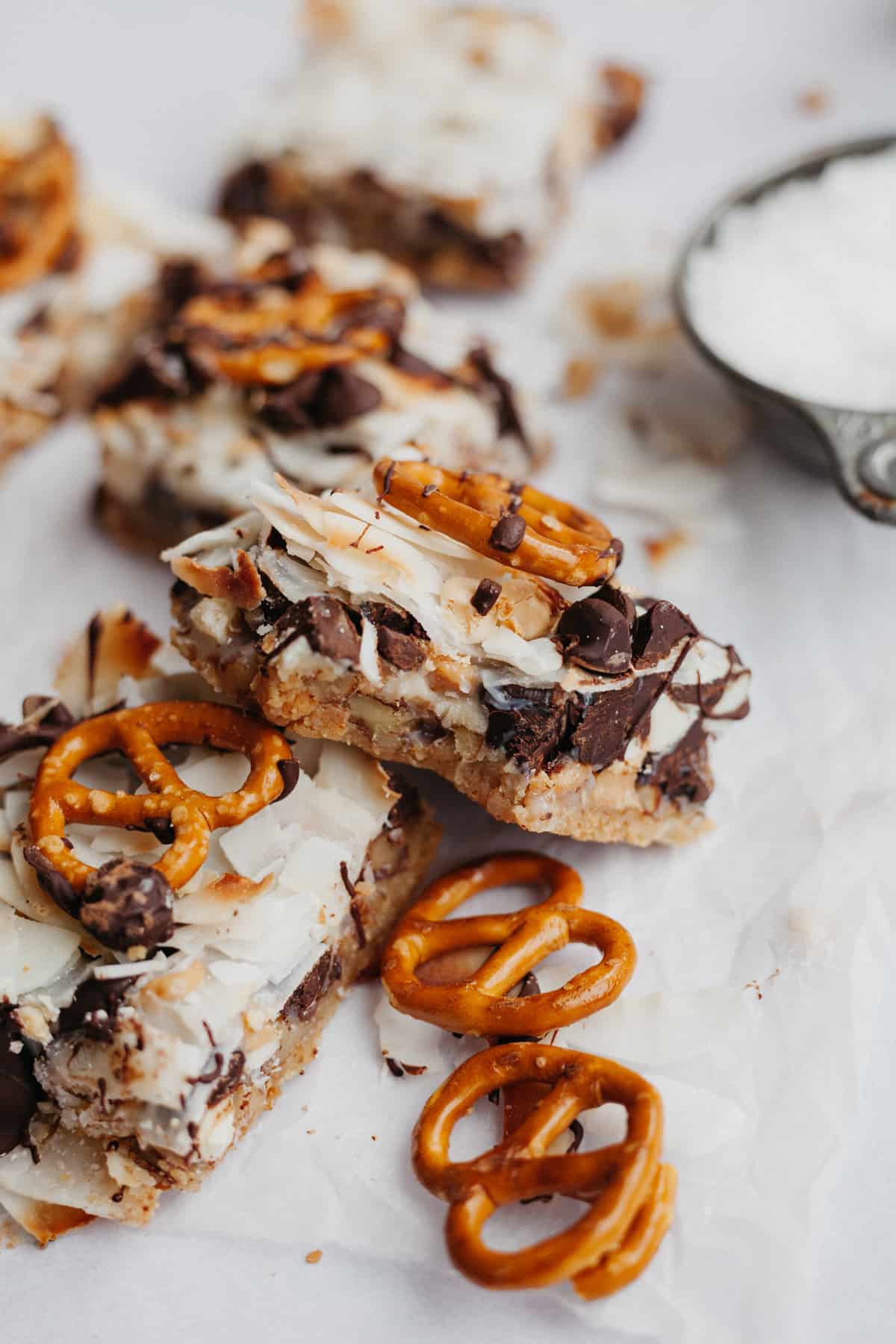 A close up of a magic cookie bar with a bite taken out of it
