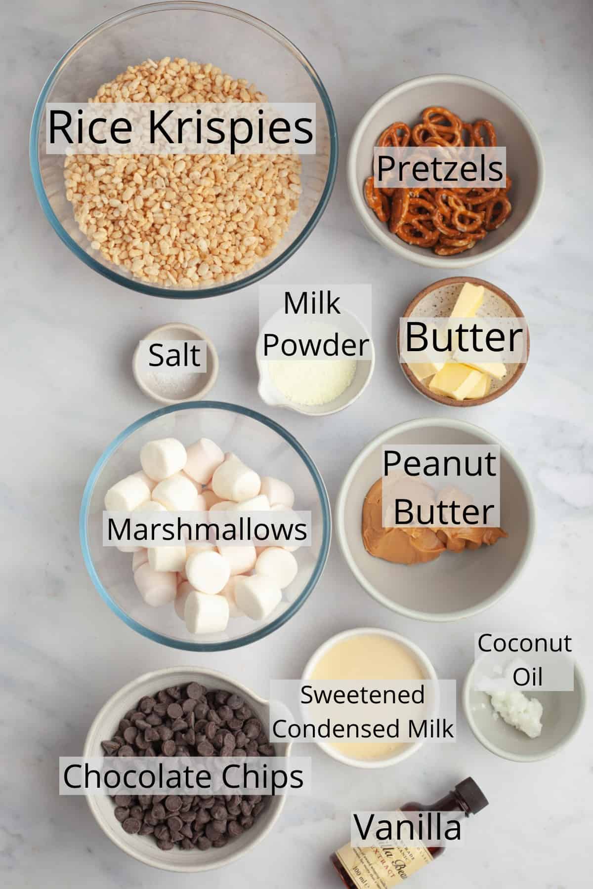 All the ingredients needed to make chocolate peanut butter rice krispie treats.