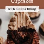 A chocolate frosted cupcake with a bite taken out, showing a nutella filling.