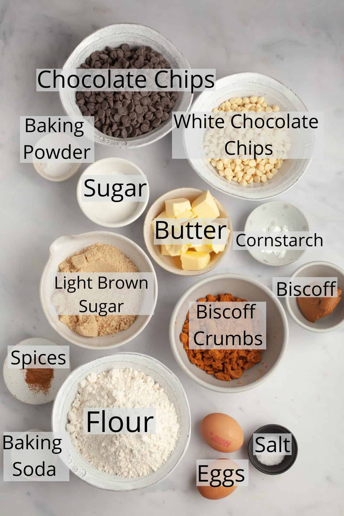 All the ingredients needed to make cookie butter cookies, weighed out into small bowls.