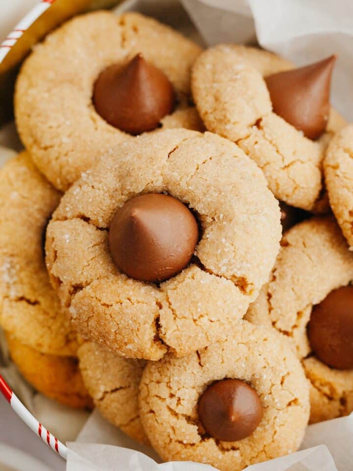Peanut butter thumbprint cookies in a tin.