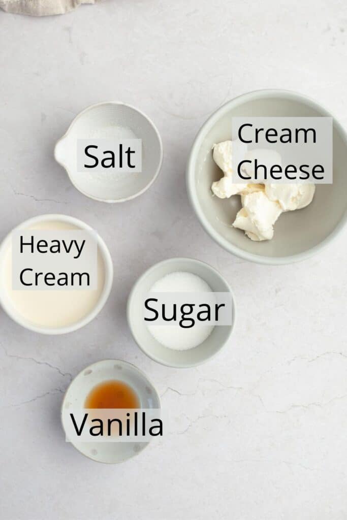 Ingredients needed for cream cheese frosting weighed out into small bowls.