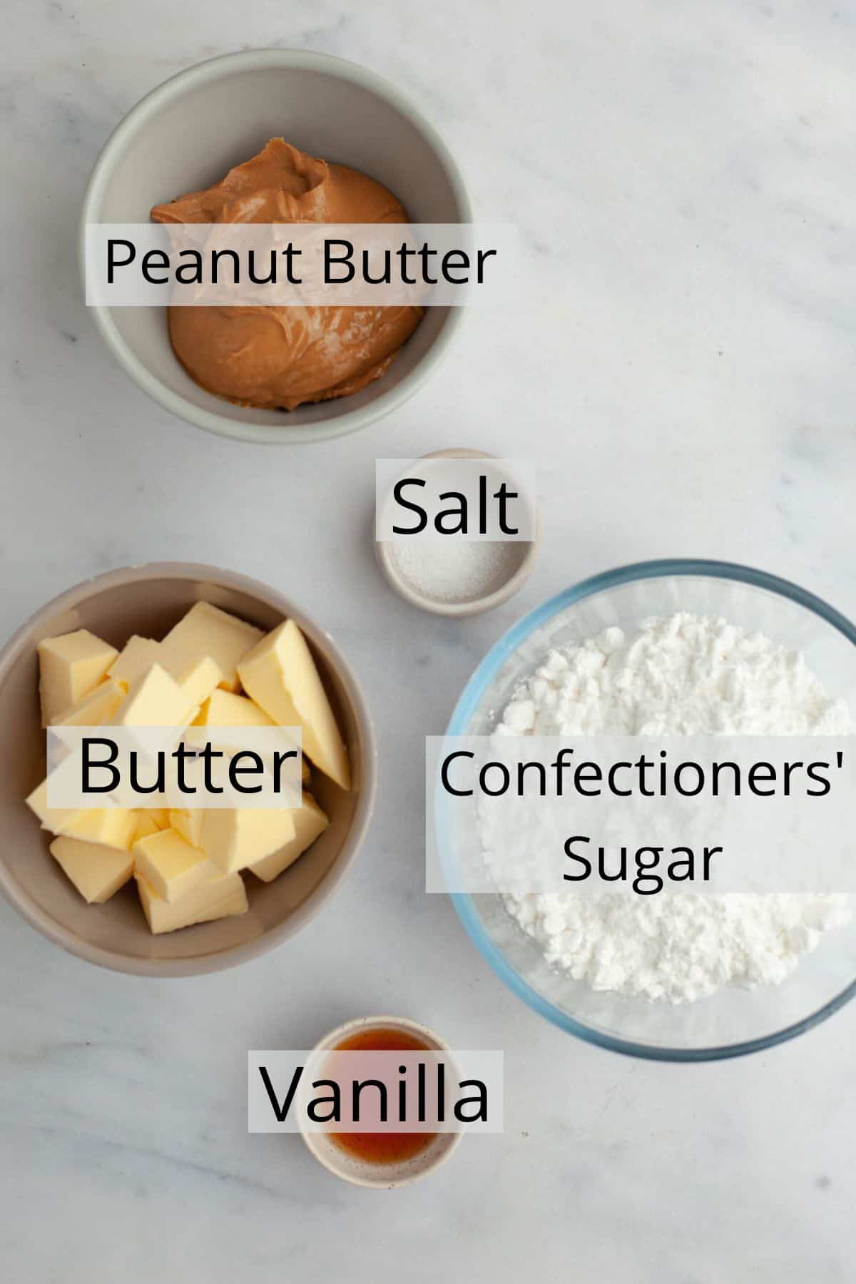 The ingredients needed to make no bake peanut butter fudge weighed out into small bowls.