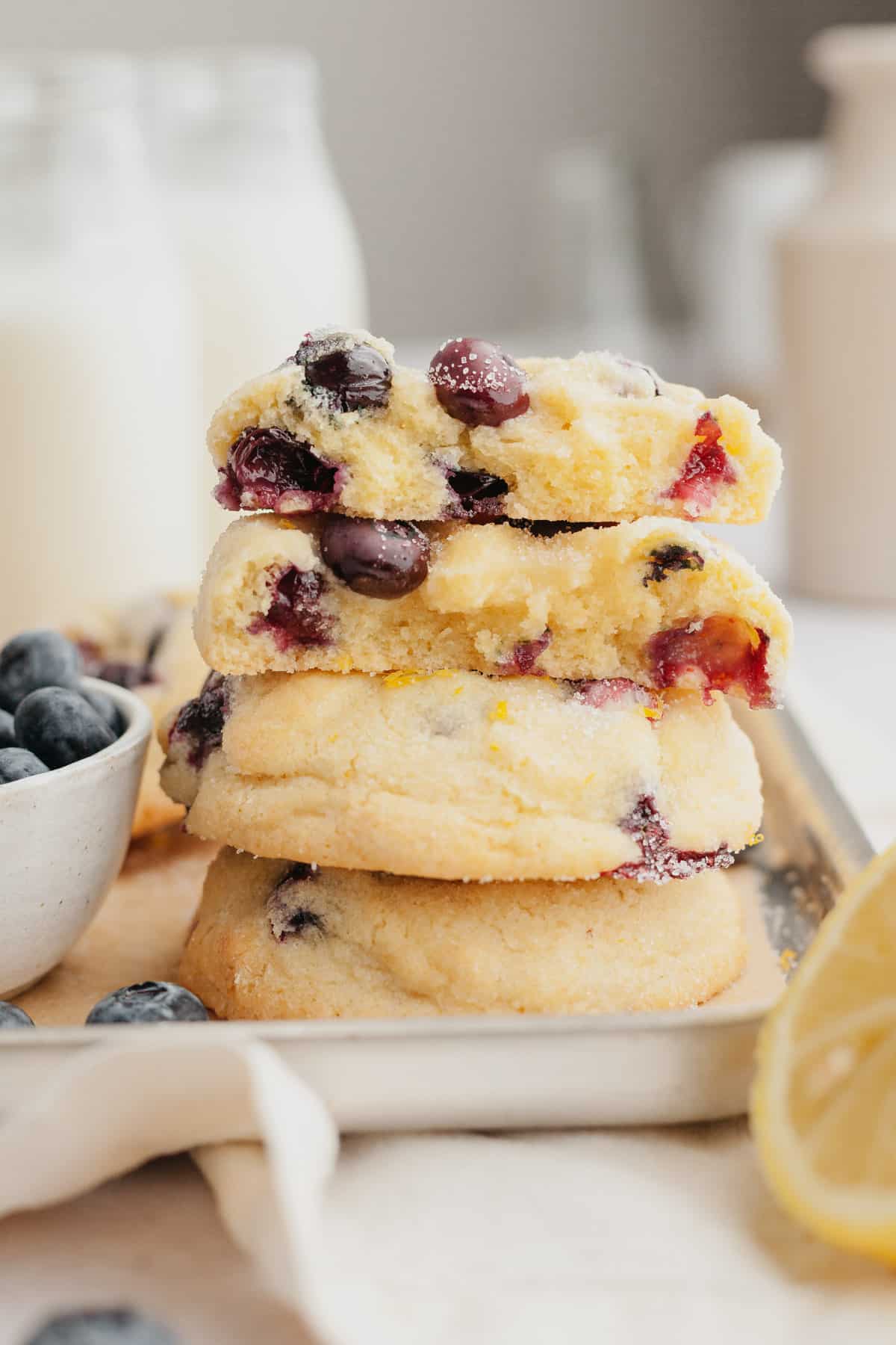 A stack of lemon blueberry cookies cut in half.