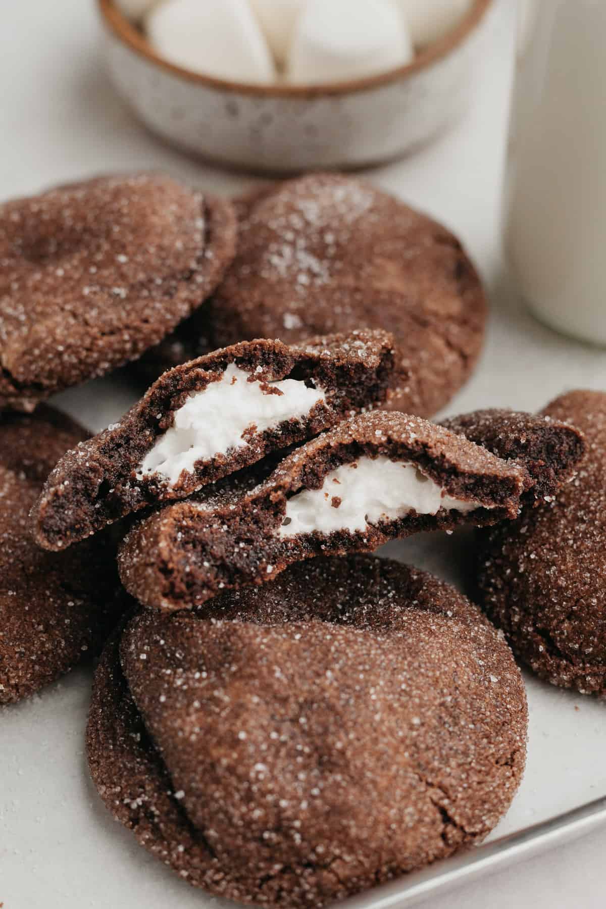 Chocolate marshmallow cookies on parchment paper.
