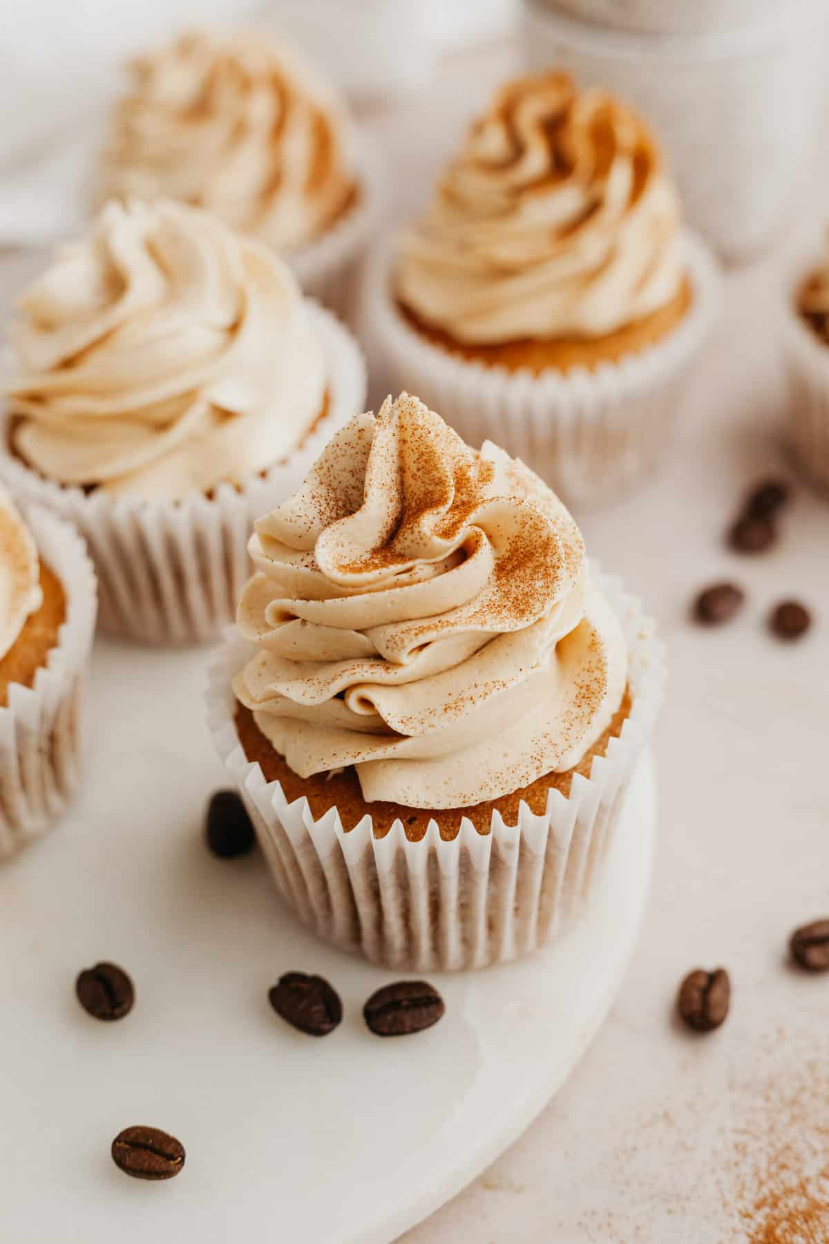 A few espresso cupcakes with frosting.