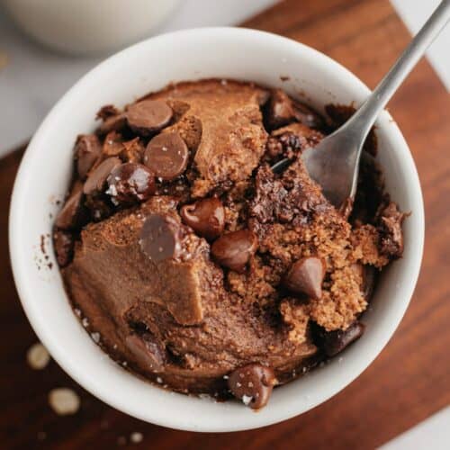 Chocolate baked oats in a small white dish.