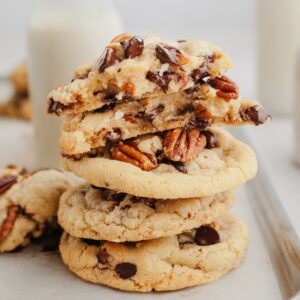 A stack of pecan chocolate chip cookies.