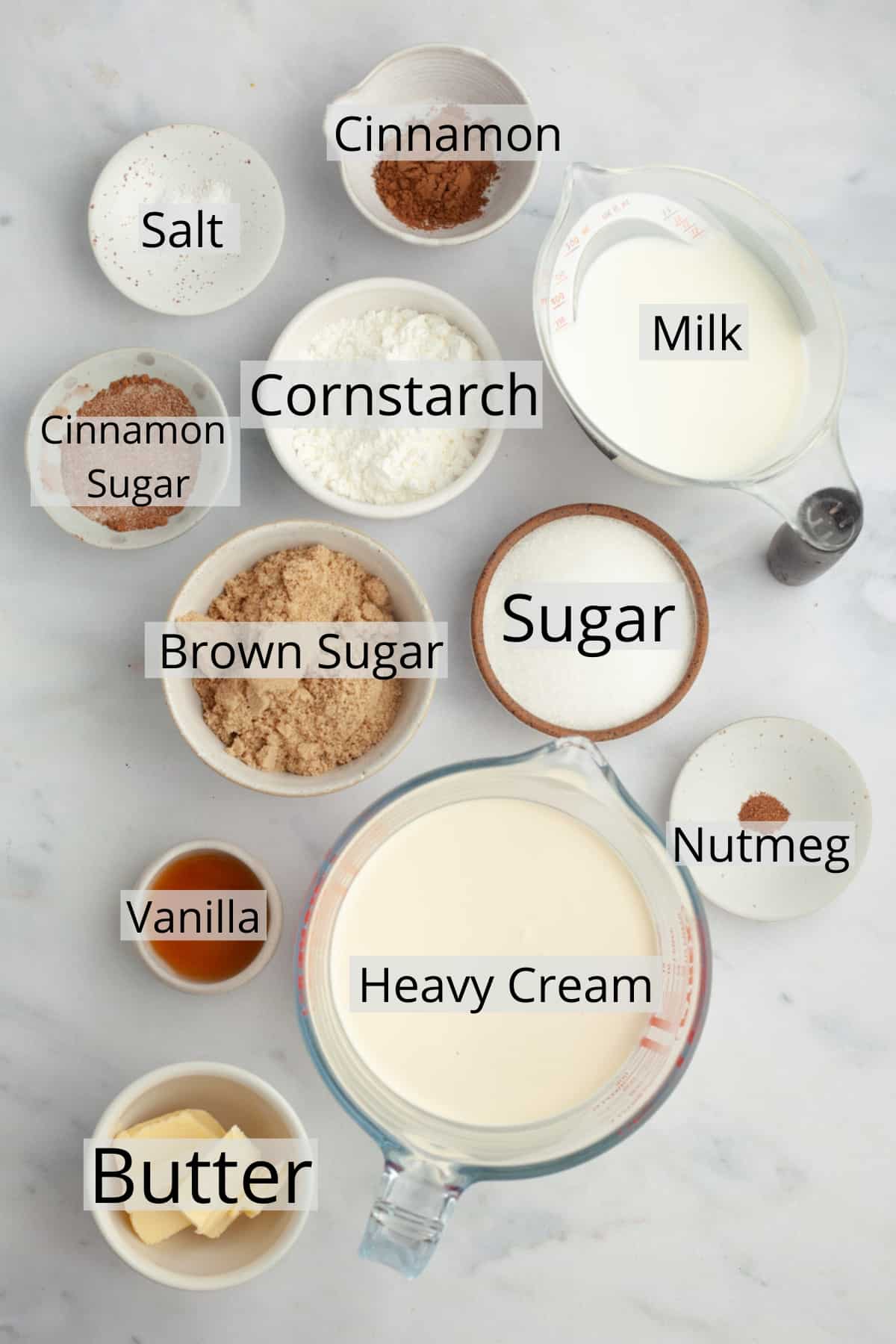 All the ingredients needed to make cinnamon pie, weighed out into small bowls.