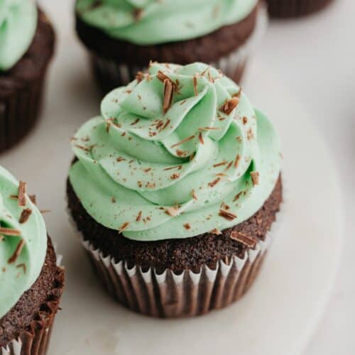 Chocolate cupcakes with green frosting.