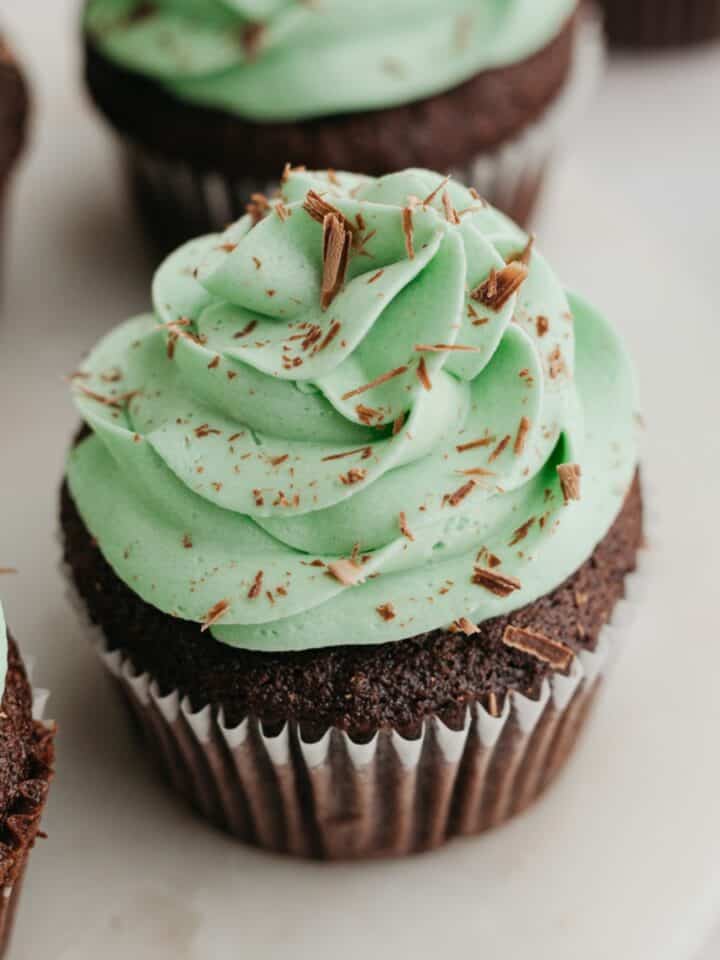 Chocolate cupcakes with green frosting.