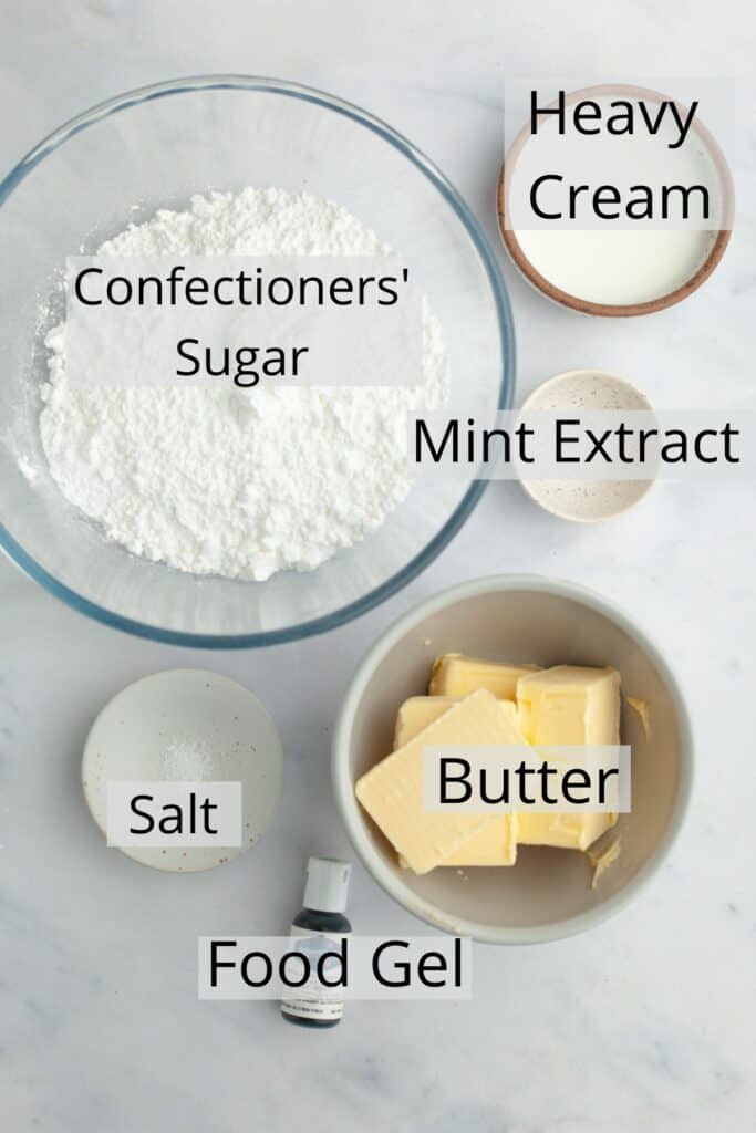 All the ingredients needed to make mint frosting, weighed out into small bowls.