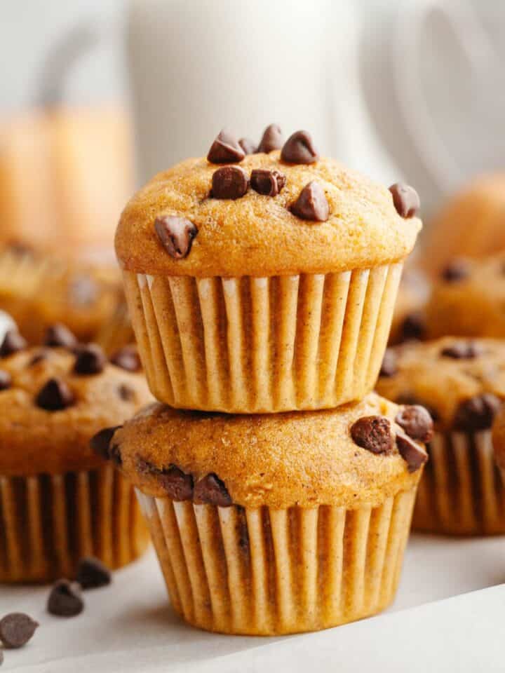 A stack of two mini pumpkin muffins.