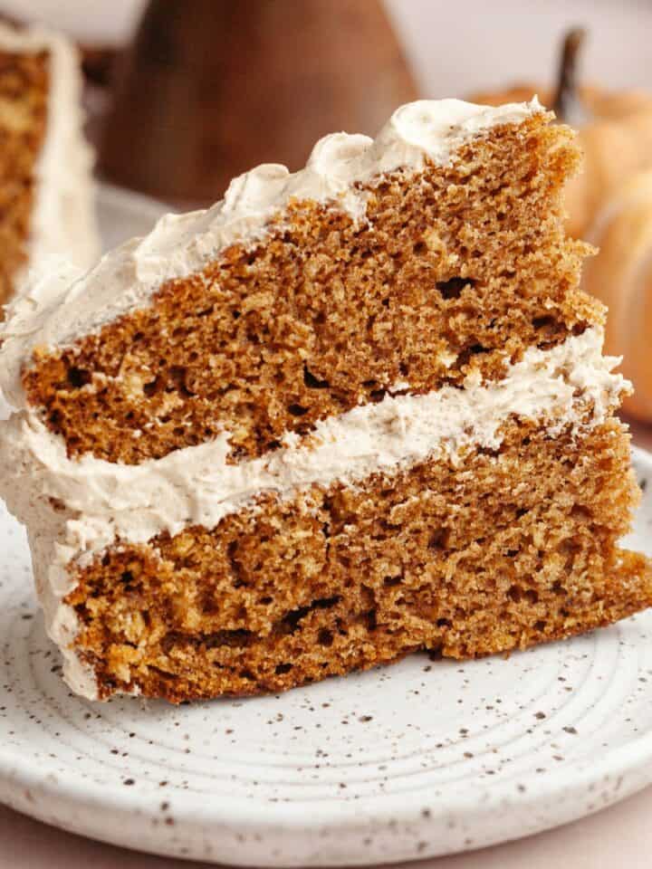 A slice of pumpkin spice latte cake on a plate.