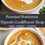 A white soup bowl with butternut squash cauliflower soup, drizzled with cream and garnished with herbs.