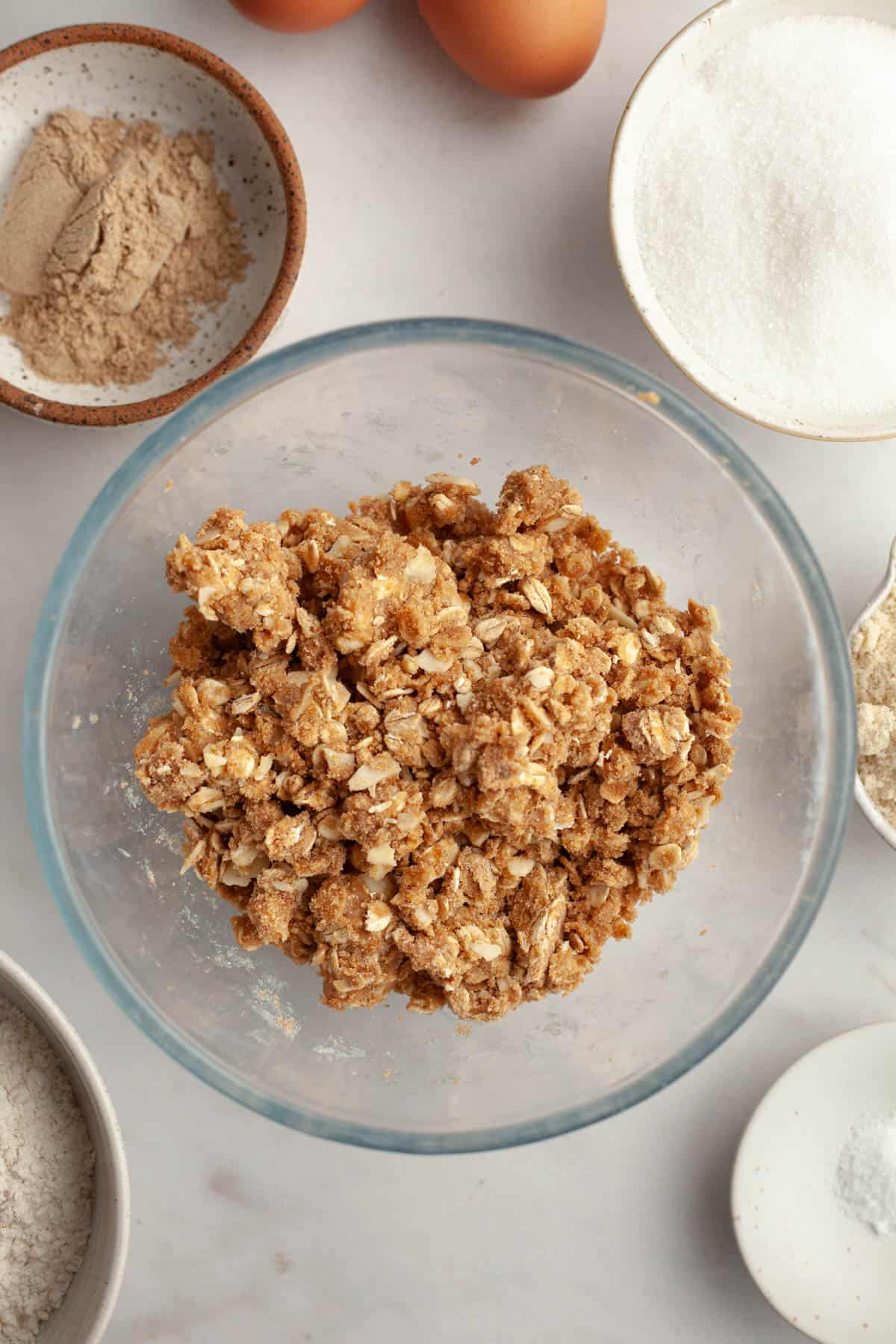 An oat streusel in a small glass bowl.