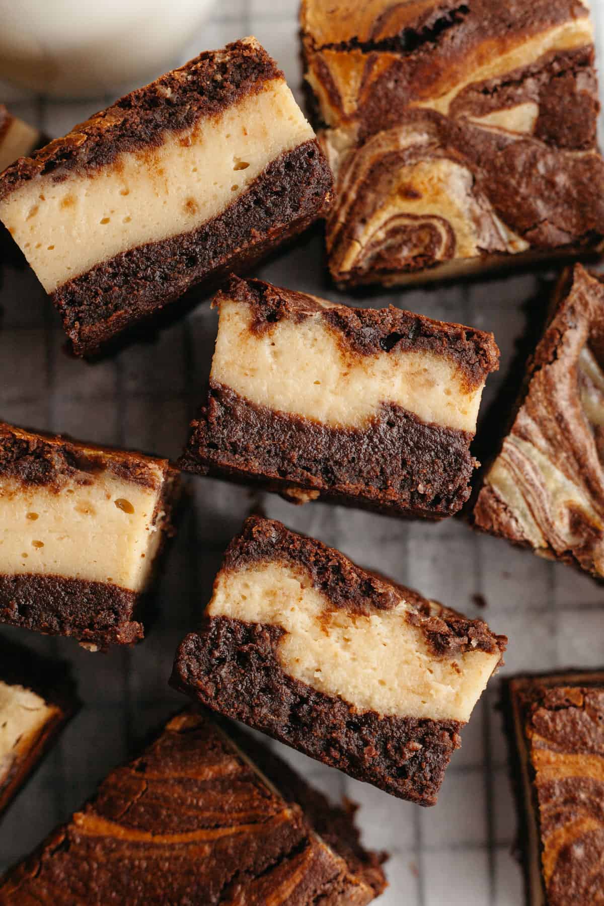 A close up of peanut butter cream cheese brownies.