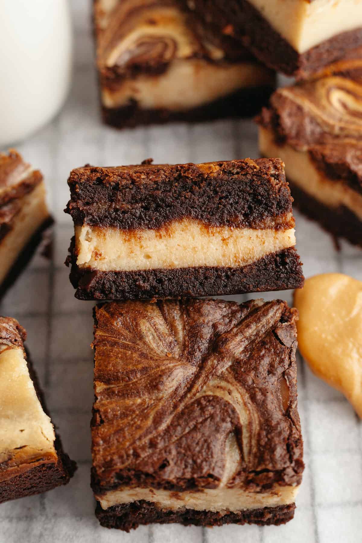 A close up of peanut butter cream cheese brownies.