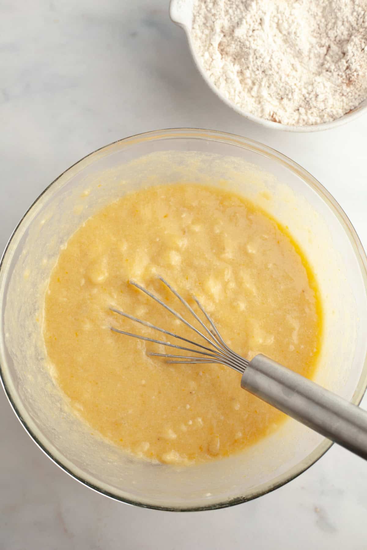 Banana muffin batter in a bowl.