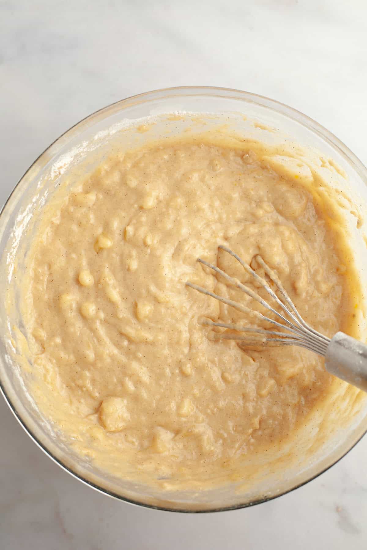 Banana muffin batter in a bowl.