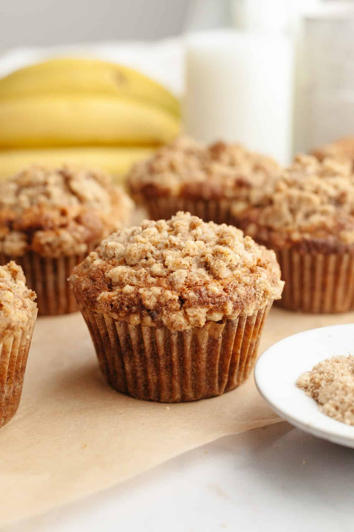 Banana coffee cake muffins with streusel topping.