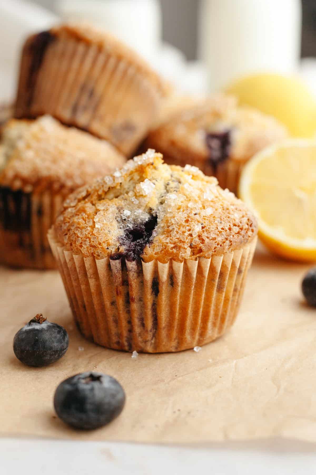 A close up of a lemon blueberry poppy seed muffin.