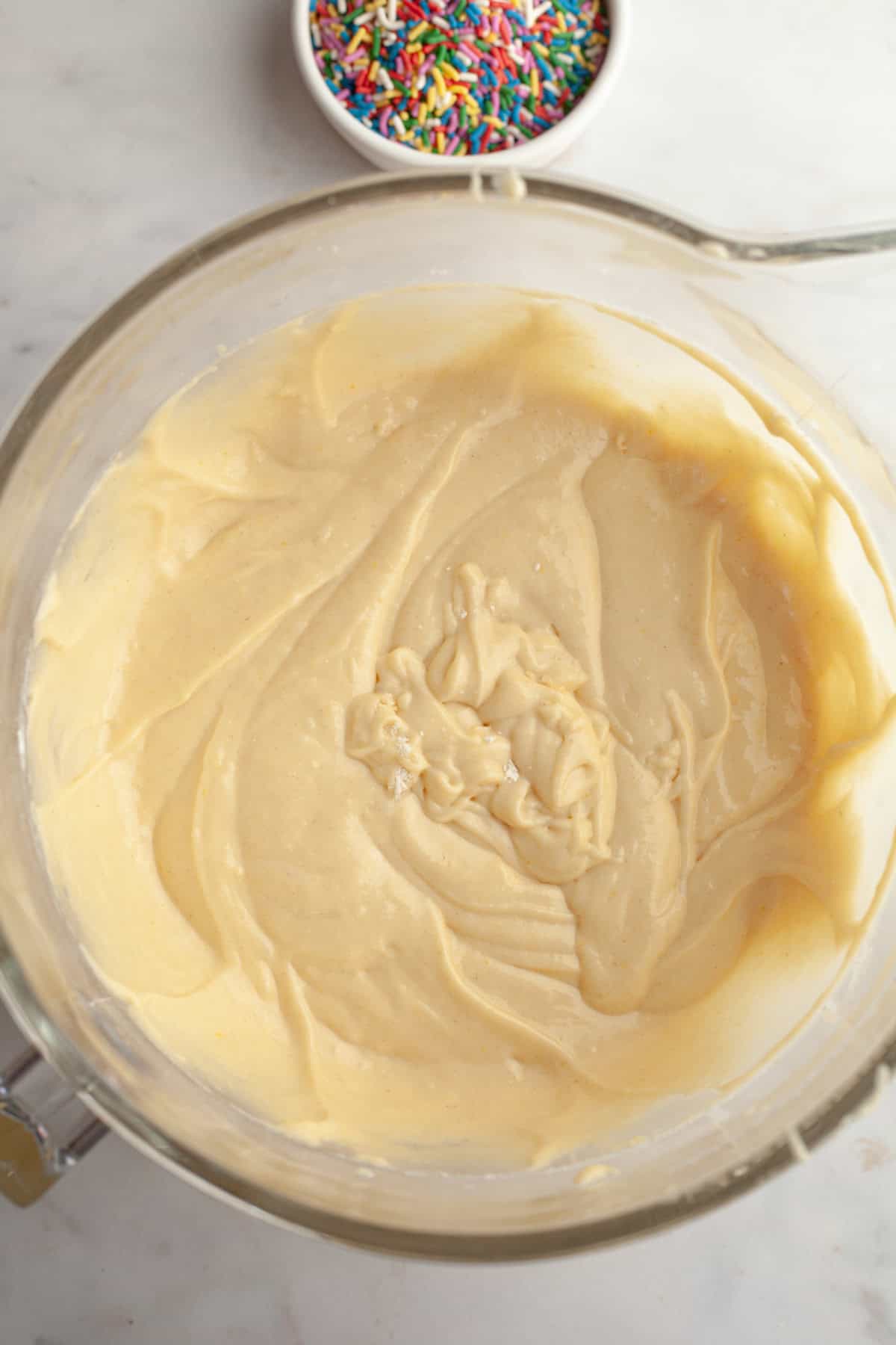 Cake batter in a large mixing bowl.
