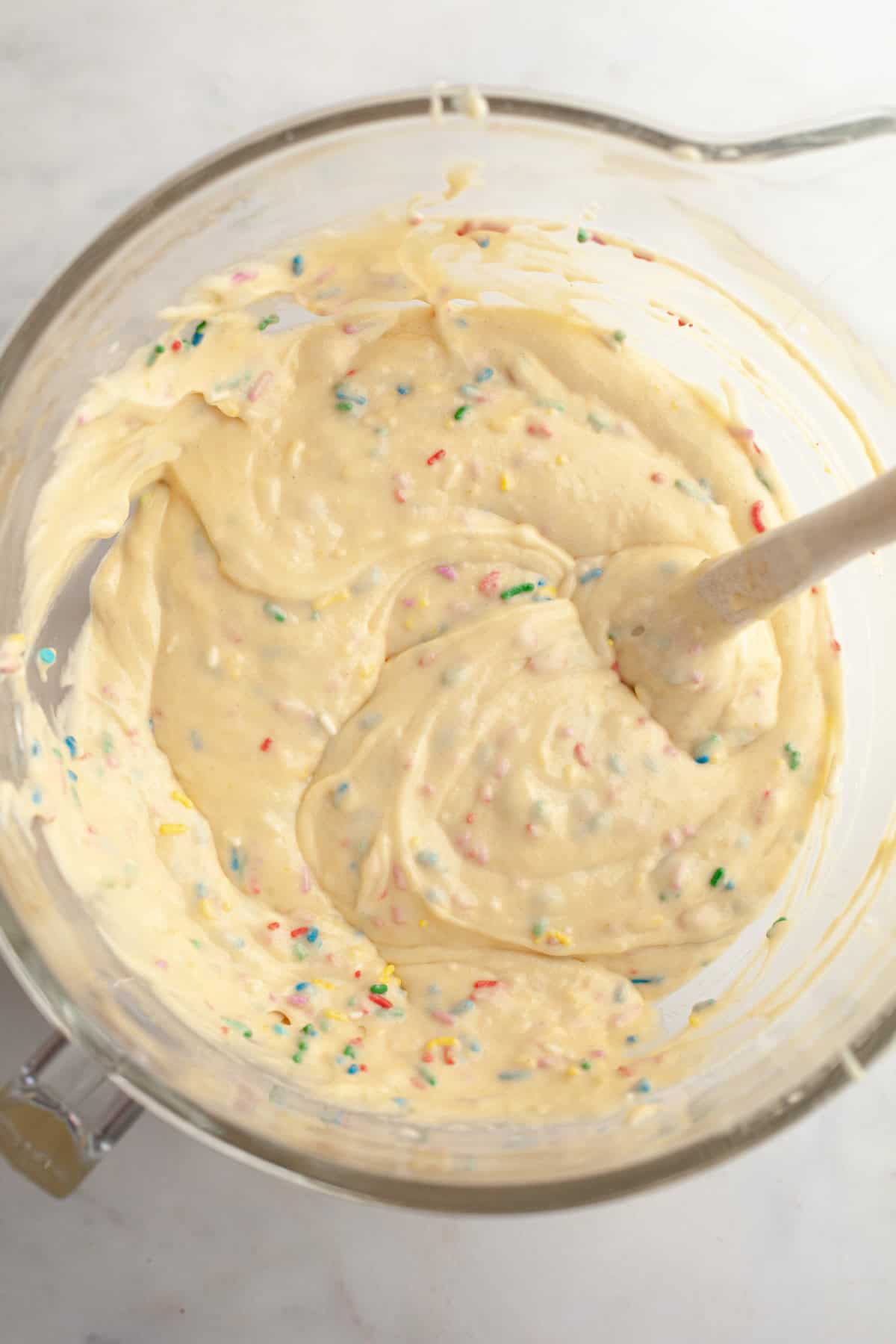 Funfetti cake batter in a large mixing bowl.