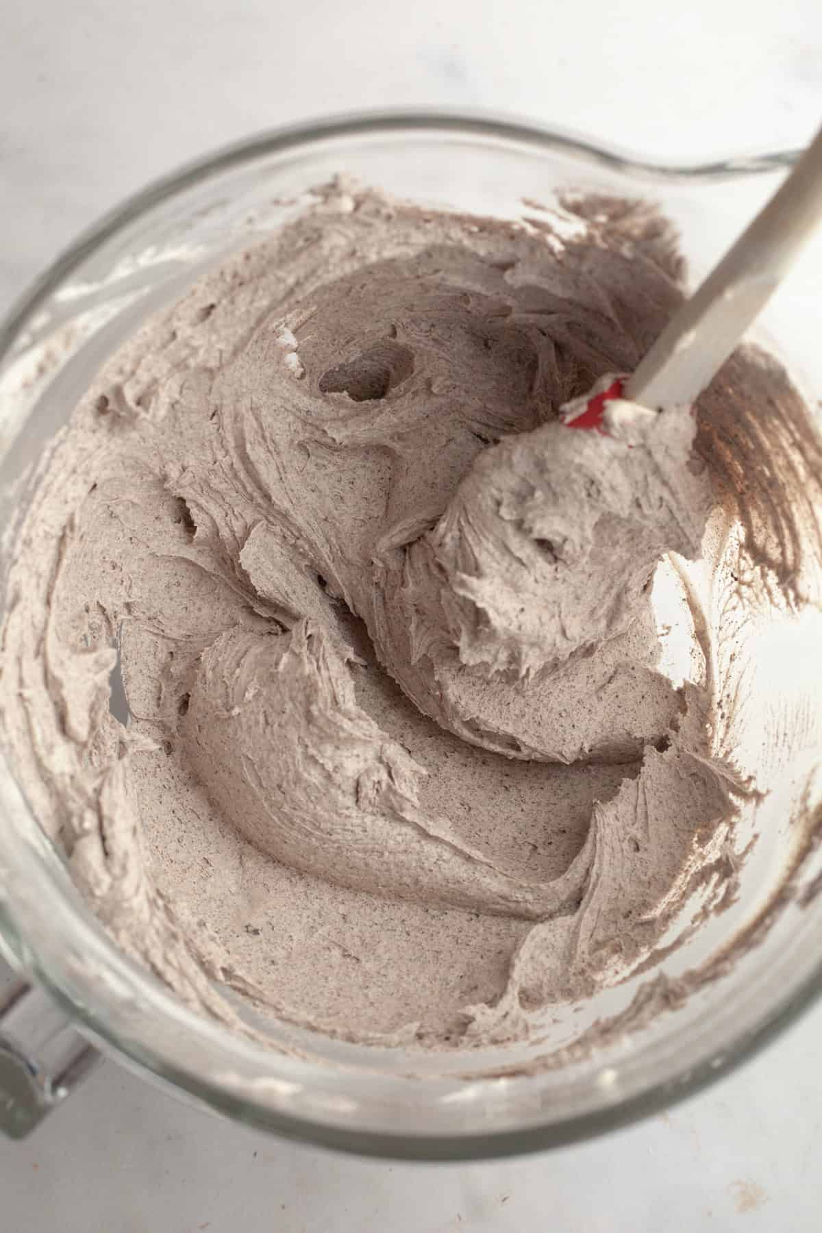 Oreo frosting in a large mixing bowl.