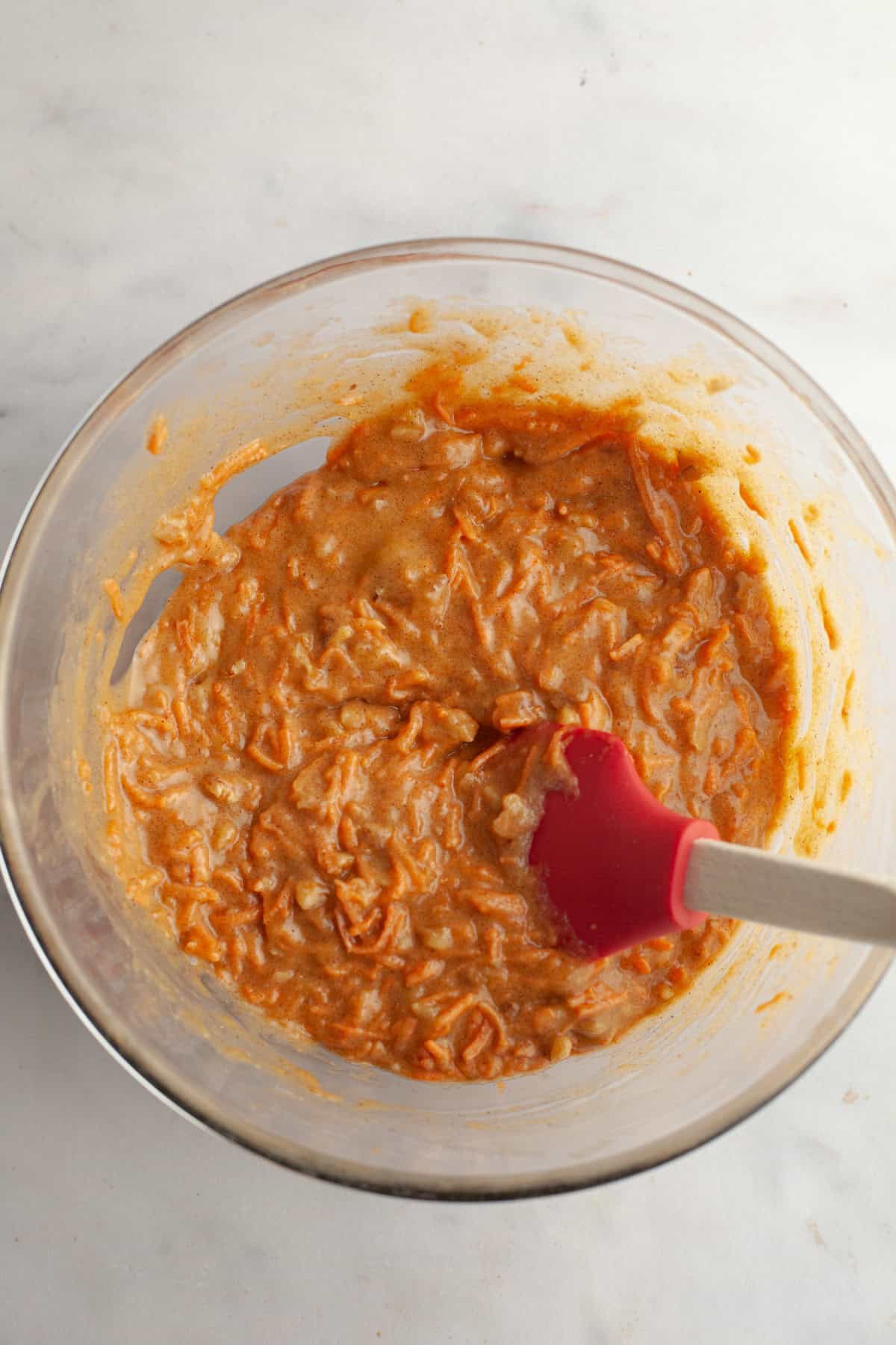 Carrot cake batter in a bowl.