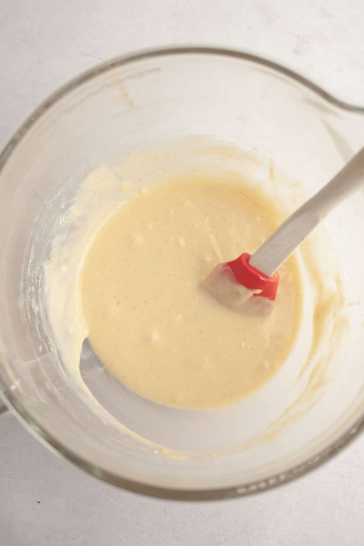 Vanilla bean cupcake batter in a bowl.