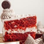 A close up of a slice of Oreo red velvet cake.
