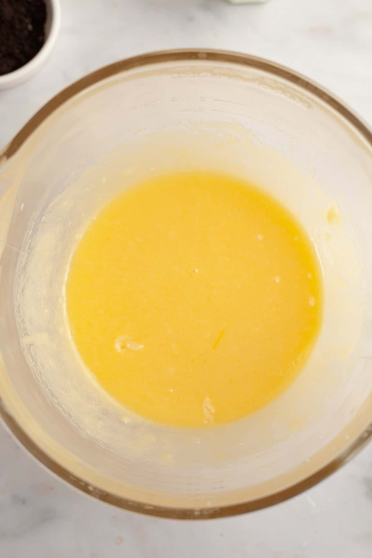 Pale yellow mixture in a glass bowl.