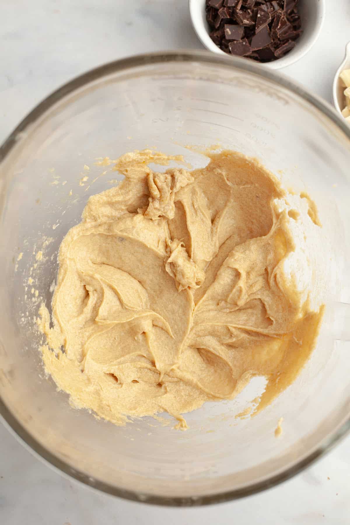 Cookie dough in a glass bowl.