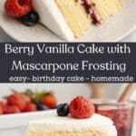 A slice of a berry vanilla layer cake with white frosting, berry jam filling, and topped with a raspberry and blueberry, on a plate with strawberries and jam jar in the background.