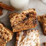 A close up of banana coffee cake, drizzled with a white glaze.