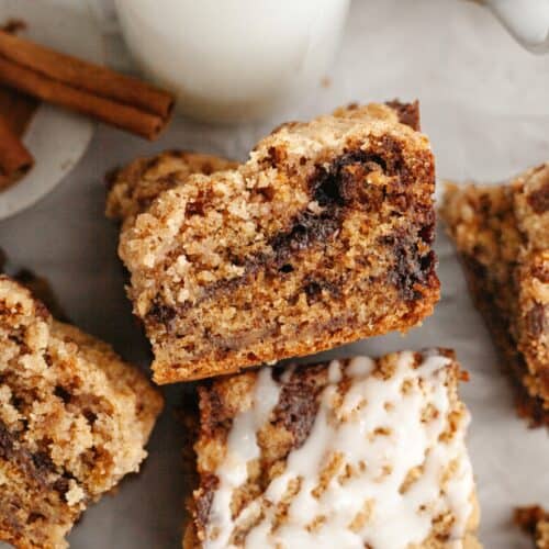 A close up of banana coffee cake, drizzled with a white glaze.
