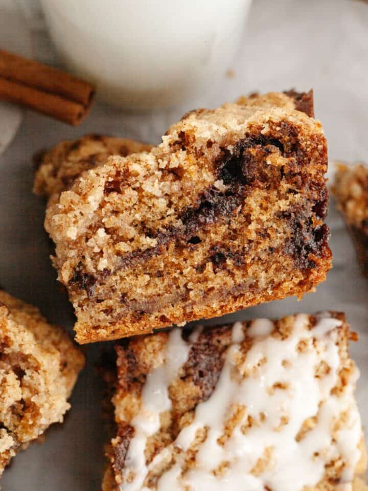 A close up of banana coffee cake, drizzled with a white glaze.