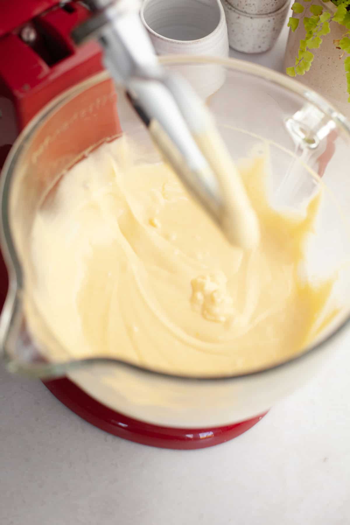 Vanilla cake batter in a stand mixer.