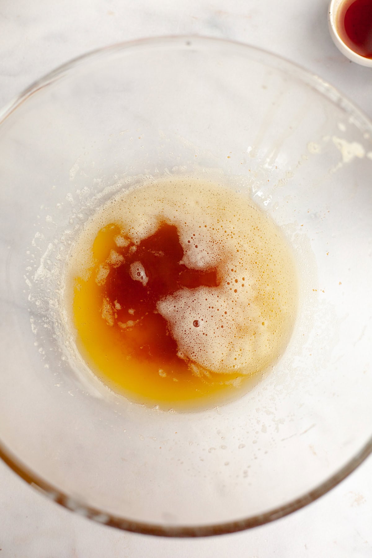 Brown butter in a glass bowl.