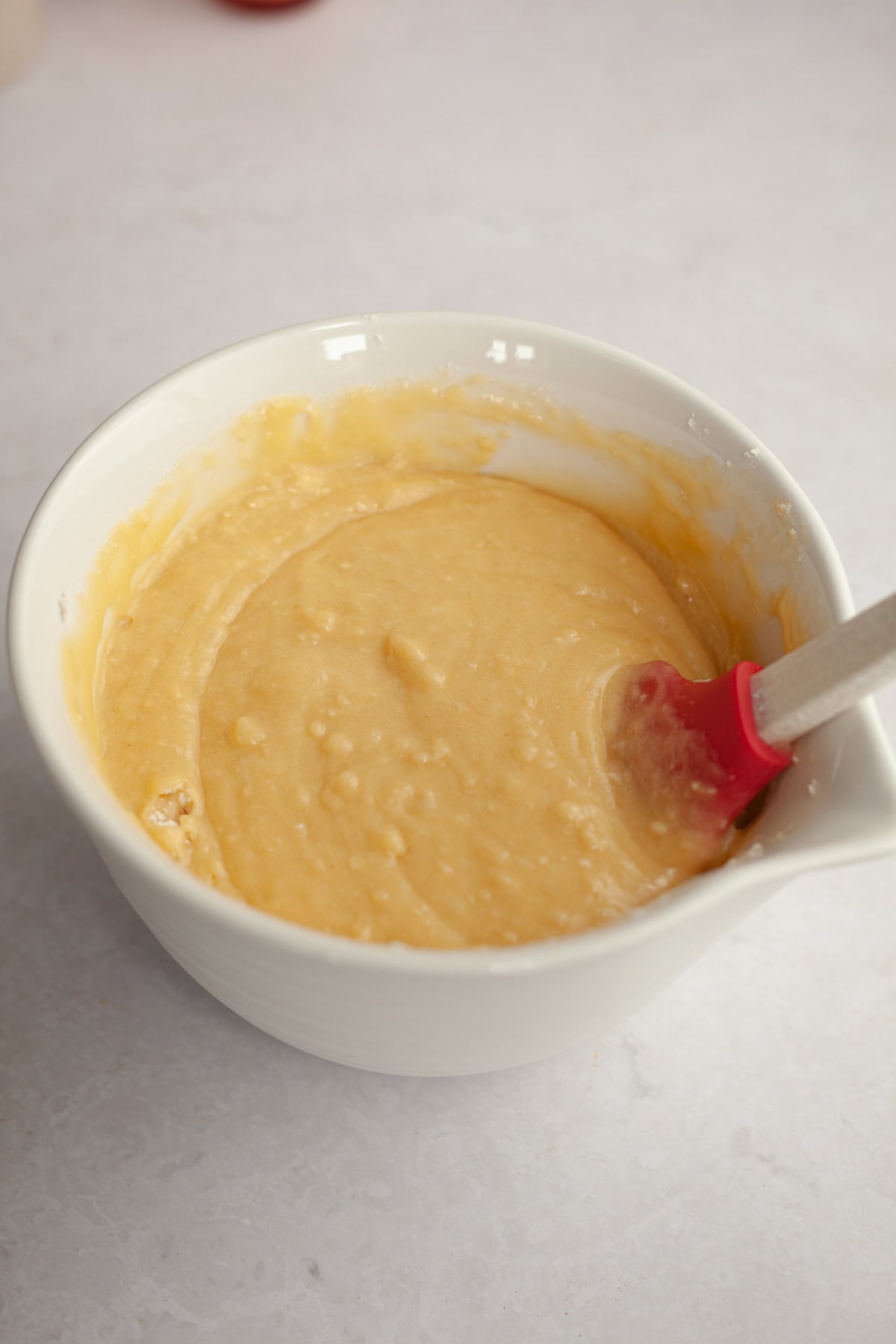 Pound cake batter in a mixing bowl.