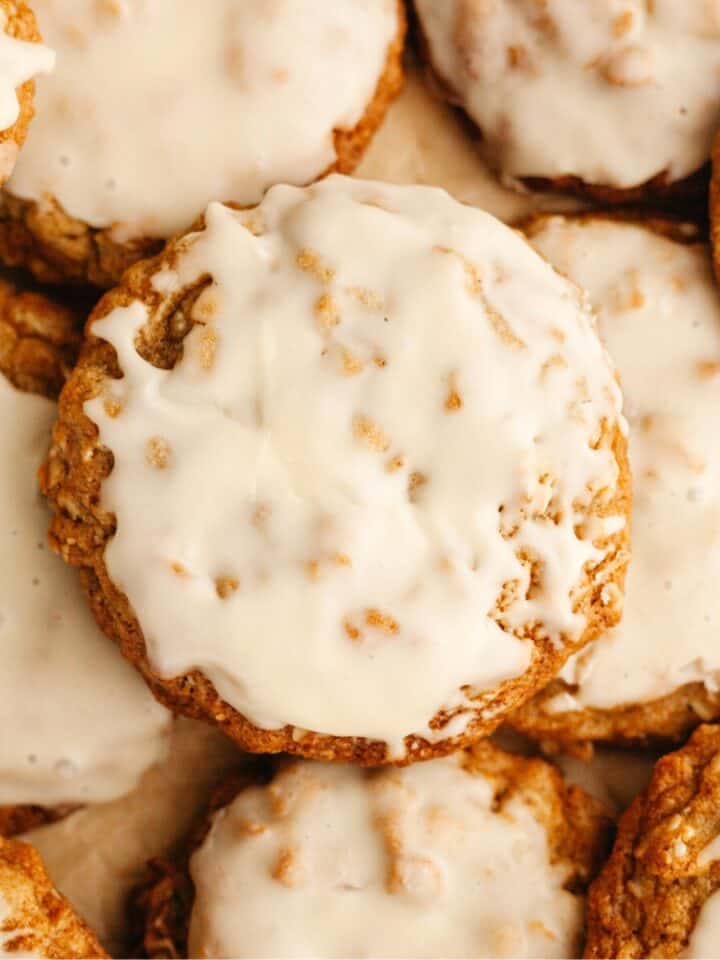 A close up of glazed cardamom oatmeal cookies.