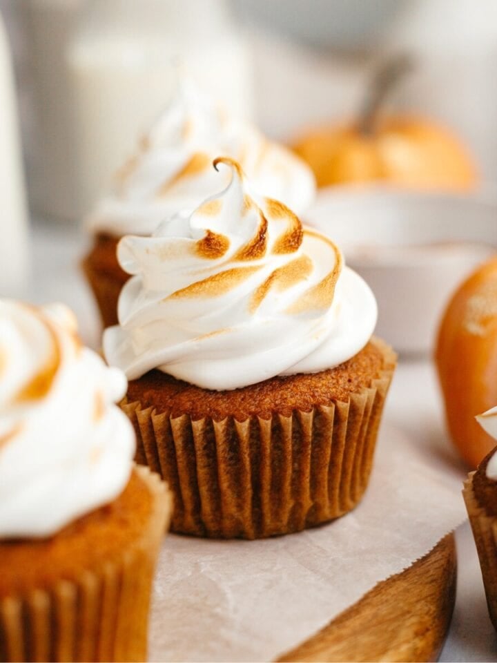 Pumpkin cupcakes with toasted marshmallow frosting.