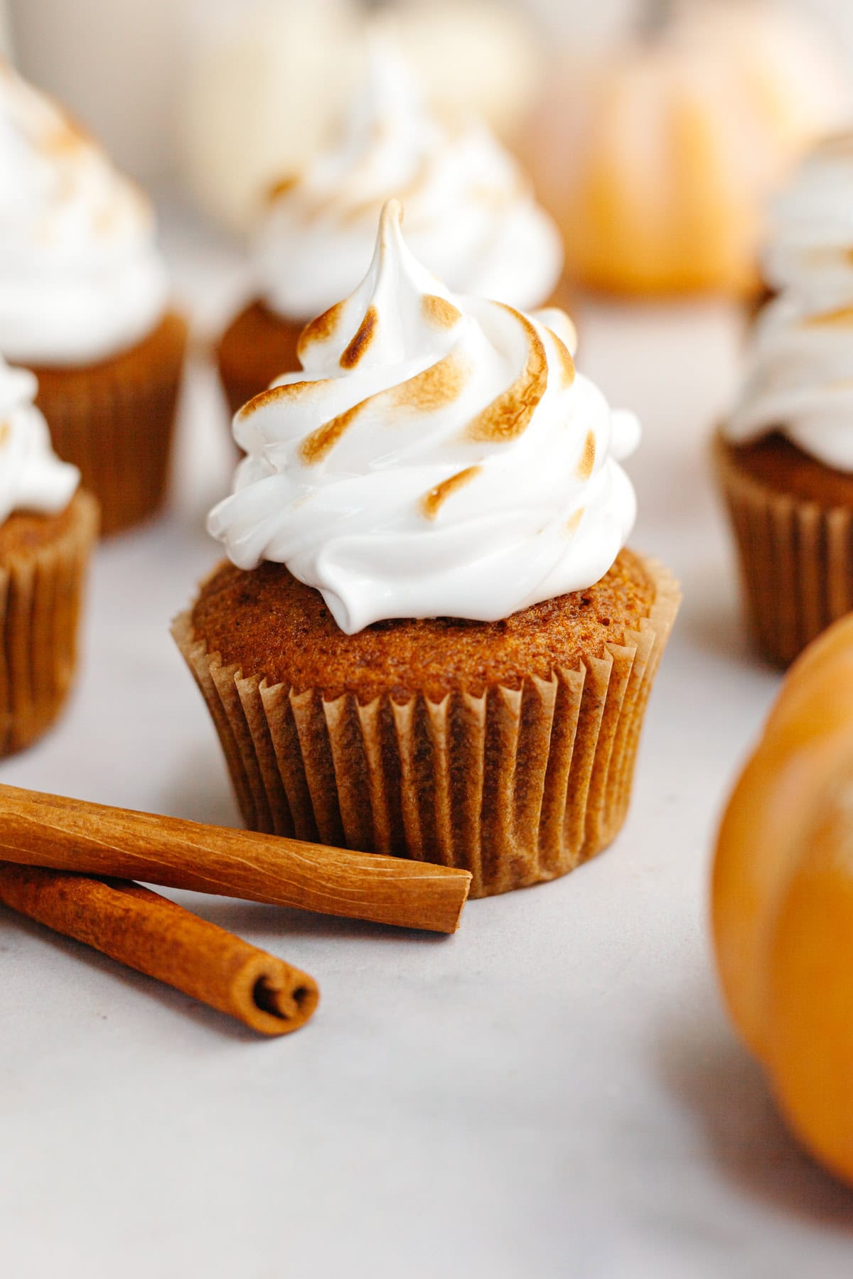 Pumpkin cupcakes with toasted marshmallow frosting.