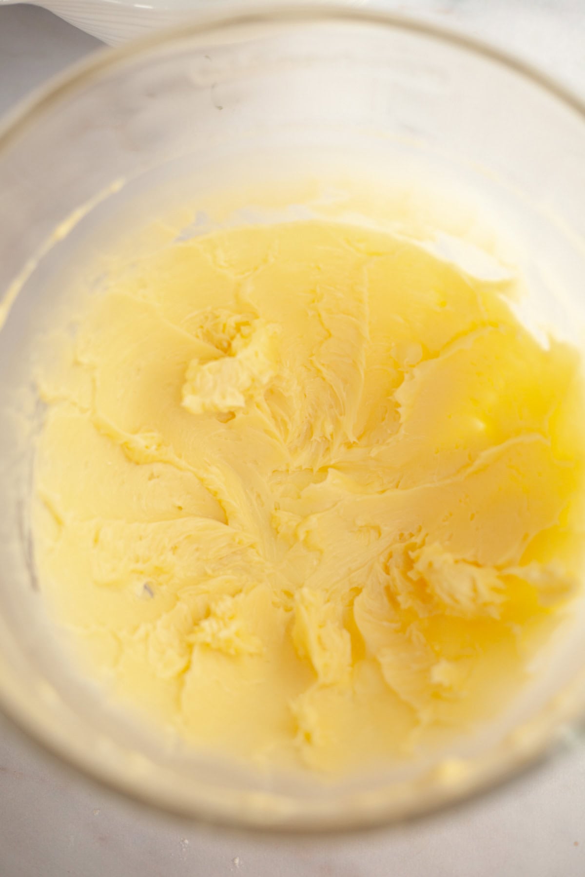 Creamed butter and sugar in a mixing bowl.