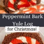 A chocolate yule log with white and red striped filling, decorated with meringue mushrooms, and a slice of the cake on a small plate.