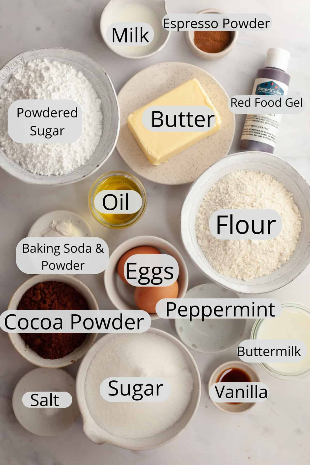 All the ingredients needed to make peppermint mocha cake, weighed out into small bowls.